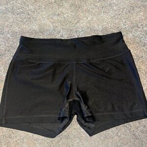 Black biker shorts with high rise waist band. Stretchy fabric.